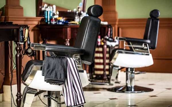 depositphotos_418037762-stock-photo-professional-hairstylist-in-barbershop-interior