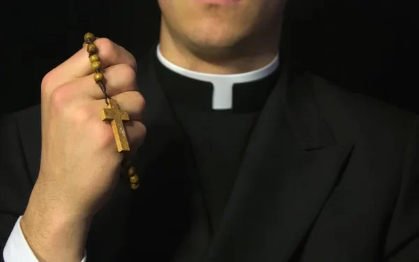 depositphotos_9631882-stock-photo-young-priest-praying