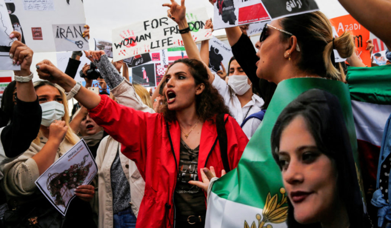 FILE PHOTO: Protesters shout slogans during a demonstration following the death of Mahsa Amini in Iran, in Istanbul